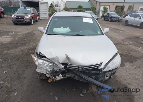 2006 Toyota Camry Le z USA, uszkodzony, nr VIN 4T1BE30K06U112890
